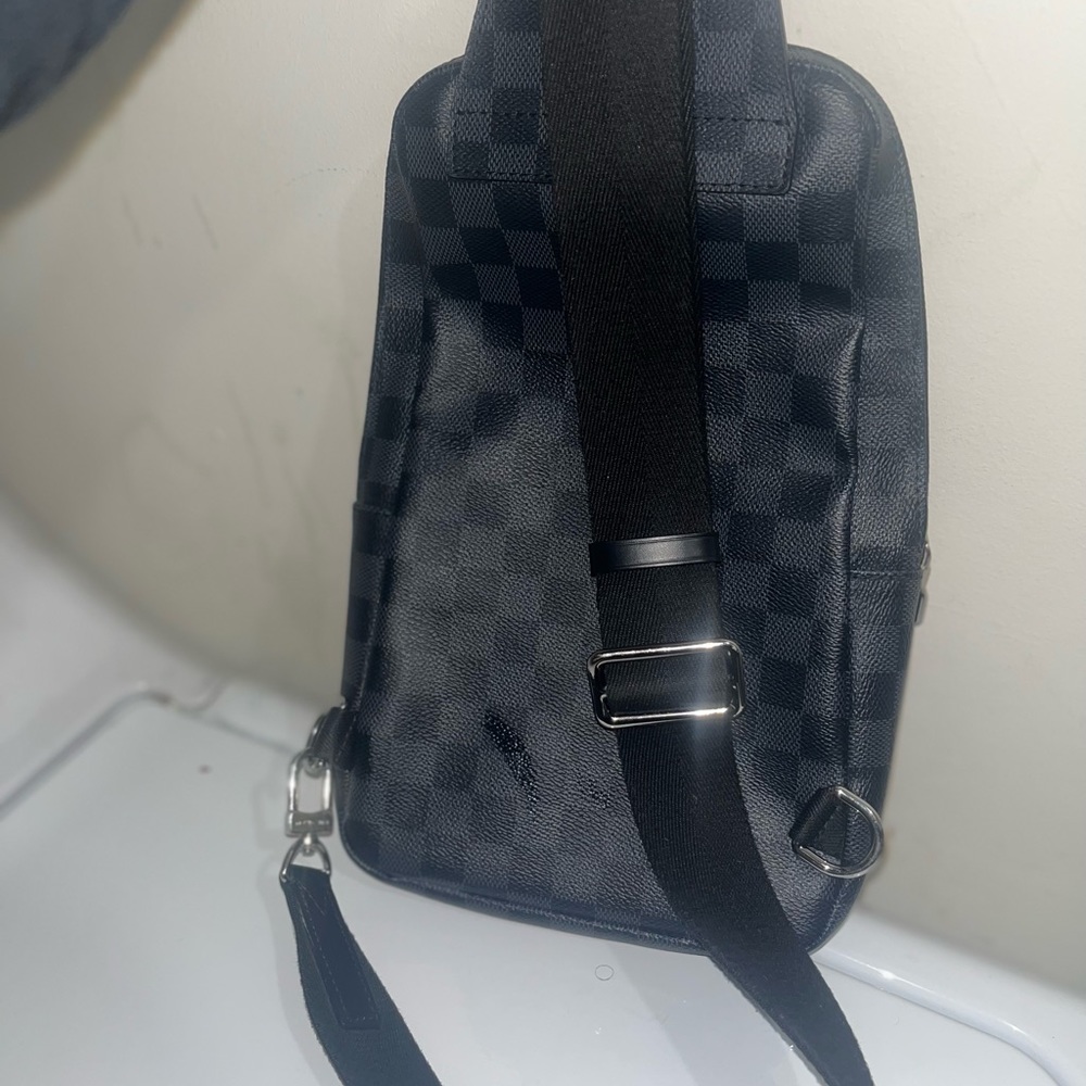 Black mens crossbody Louis Vuitton Bag.